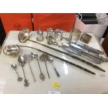 Group of silver and white metal items to include two toddy ladles, silver mustard pot, silver handle