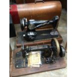 Three vintage sewing machines to include two Singer and Frister & Rossmann, together with Underwood