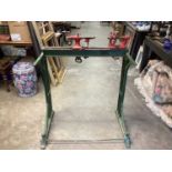 Green and red painted cast iron lathe stand