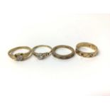 Four 9ct gold gem set dress rings