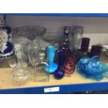 Collection of antique and later glassware, including cut cranberry glasses, decanters, etc