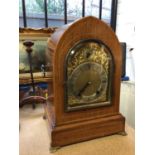 Late 19th century 8 day bracket clock by Winterhalder & Hofmeier with arched brass dial in lancet