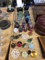Collection of paperweights, scent bottles and other glass, including Isle of Wight, Langham and Fabe