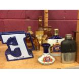 Half bottle Dimple Scotch Whisky with empty Bells jars Worthington E jug, Pusser's Navy rum and mini