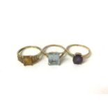 Three 9ct gold gem set dress rings