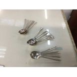 Three sets of 6 silver coffee spoons, (18 spoons)
