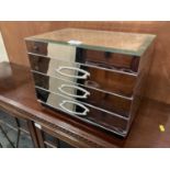 Modern mirrored jewellery cabinet