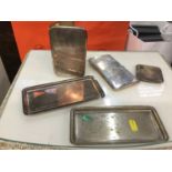 Two silver cigarette cases, silver powder compact and two continental silver (800 standard) trays