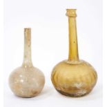Two Roman glass flasks