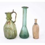 Three Roman glass flasks