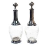 Pair of French silver mounted decanters in fitted case