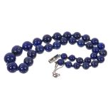 Lapis lazuli bead necklace with sapphire and diamond clasp