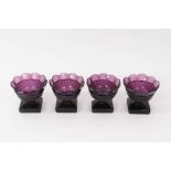 A set of four 19th century amethyst tinted glass salts