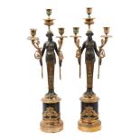 Pair of Empire style bronze and ormolu three branch candelabra