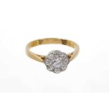 Diamond cluster ring with a flower head cluster of nine old cut diamonds in platinum millegrain sett