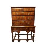 Early 18th century walnut chest on later stand