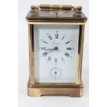 20th century French brass carriage clock with hour repeating eleven jewel movement and alarm mecha