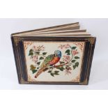 A 19th Century leather and tapestry mounted album containing a large number of botanical watercolour