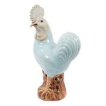 Large Chinese celadon glazed model of a cockerel, with biscuit glazed face and crest, 19th/20th cent