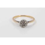 Edwardian diamond cluster ring with a flower head cluster of seven old cut/single cut diamonds