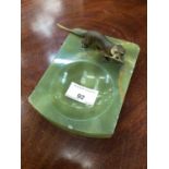 Onyx dish surmounted by a cold painted otter holding a fish