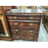 Nineteenth century continental mahogany chest of four long drawers with ornate brass handles, 101cm