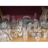 Two shelves of mixed glassware, including Victorian rummers, commemorative glass, etc