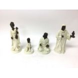 Group of four Minton china and bronze figures