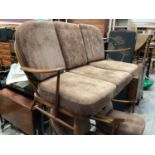 Ercol three seater settee, two arm chairs and coffee table