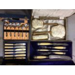 Boxed carving set, fish knives, spoons and dressing table set plus sundry china