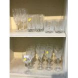 Group cut glass table wares to include champagne flutes, tumblers, etc