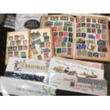 Two stamp albums together with mint stamps