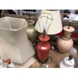 Three good quality table lamps and a brass lamp