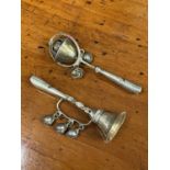 Two antique white metal babies rattles with whistles