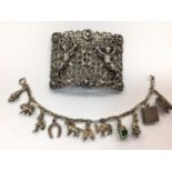 Silver nurse's buckle (Chester 1897) and silver charm bracelet