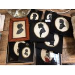 Group of nine portrait silhouettes, softly in gilt metal mounted ebonised frames