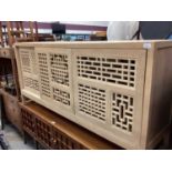 Chinese-style lightwood sideboard with three lattice work sliding doors 180 cm wide, 45 cm deep, 85