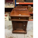 Pair of Victorian-style mahogany bedside cupboards, each with rear gallery and frieze drawer over pa