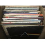 Two boxes of LP records (approx 100) including Beatles, Pink Floyd, Free and others