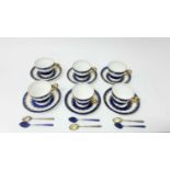 Set of six Aynsley bone china coffee cups and saucers with cobalt blue and gilt decoration with a se