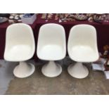 Three 1960s/70s white fibreglass chairs in the style of Eero Saarinen