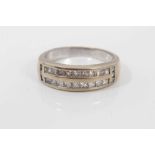 18ct white gold diamond ring with two bands of princess cut diamonds in channel setting