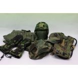 One box of various military uniform items to include canvas webbing pouches, camoflauge hats etc (1