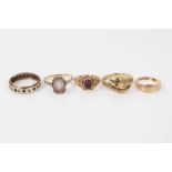 Five gold rings to include 9ct gold snake ring, 12ct gold Mizpah ring and three 9ct gold gem set rin