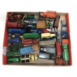 Die cast unboxed selection of early Dinky models including racing cars, saloon cars, buses and lorri