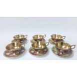 Set of six Aynsley Orchard Gold teacups and saucers