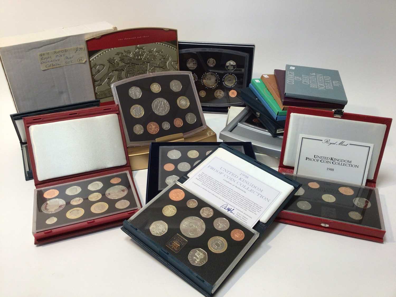 G.B. - The Royal Mint Proof sets to include 1970, 1974, 1975, 1977, 1979, 1987, 1988 (N.B. Red case)