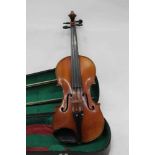 Late 19th / early 20th century violin with two bows, cased