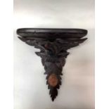 Black Forest carved wood wall bracket with an Eagle