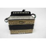 Hohner piano accordion in associated case